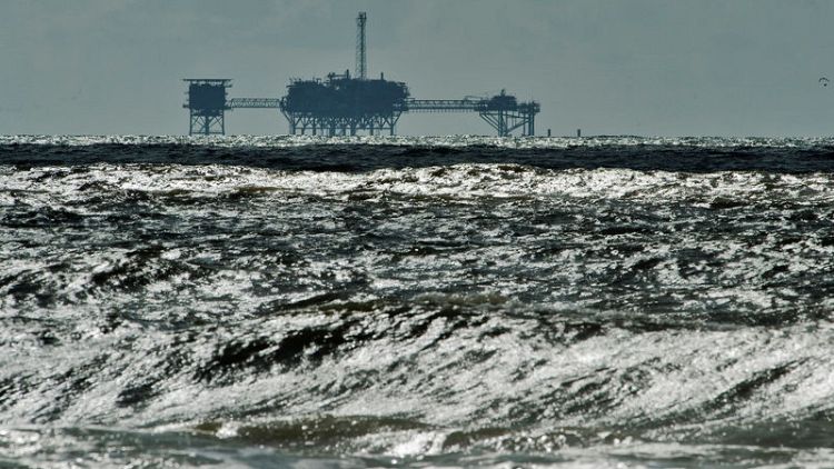 U.S. oil firms restore operations in storm-tossed Gulf of Mexico