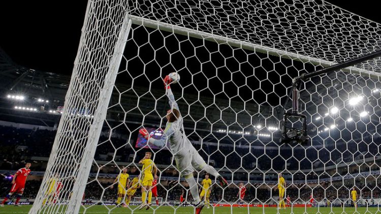 Soccer - Olsen's super save helps Sweden hold Russia to 0-0 draw