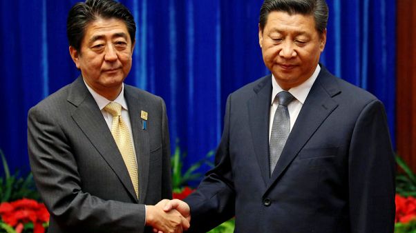 Japan's Abe pursues China thaw as U.S-Beijing ties in deep freeze Japan's Abe pursues China thaw as U.S-Beijing ties in deep freeze