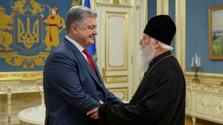 Russia vows to defend believers in Ukraine church dispute