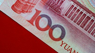 China's central bank says market to play decisive role in yuan exchange rate