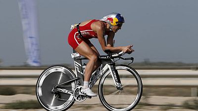 Triathlon - Lange, Ryf set records with repeat wins at Ironman Triathlon