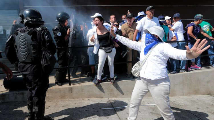 Nicaraguan police arrest protesters, quash anti-government march