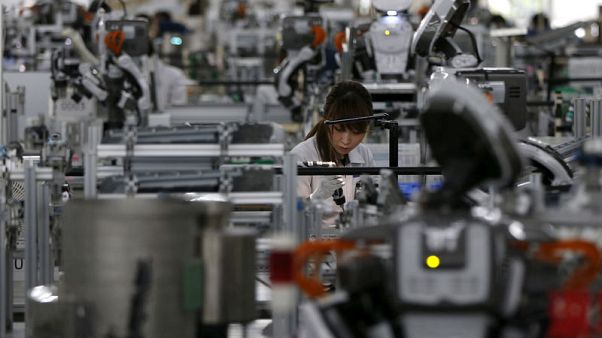 Japan manufacturers' mood rises, trade worries weigh on outlook - Reuters Tankan Japan manufacturers' mood rises, trade worries weigh on outlook - Reuters Tankan