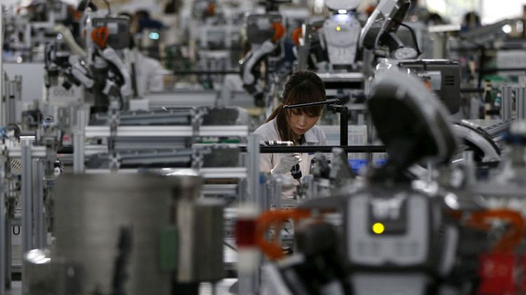 Japan manufacturers' mood rises, trade worries weigh on outlook - Reuters Tankan