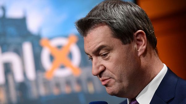Humiliating losses in Bavarian election shake Merkel's coalition Humiliating losses in Bavarian election shake Merkel's coalition