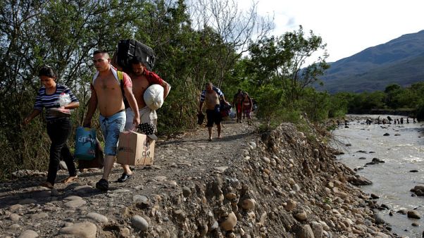 Fleeing hardship at home, Venezuelan migrants struggle abroad, too Fleeing hardship at home, Venezuelan migrants struggle abroad, too