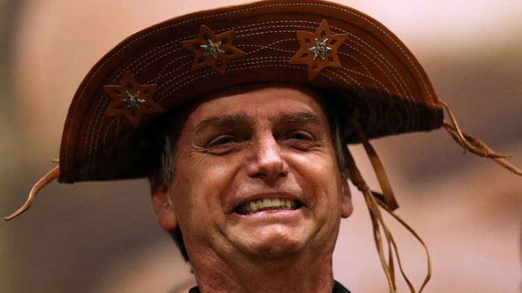 Brazil far-right candidate Bolsonaro holds commanding lead