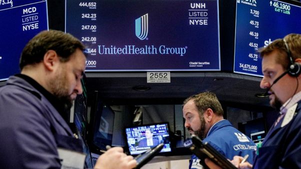 UnitedHealth tops earnings estimates, raises 2018 forecast UnitedHealth tops earnings estimates, raises 2018 forecast