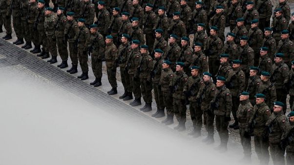 In training with Poland's volunteer militia In training with Poland's volunteer militia