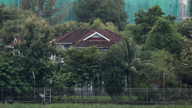 Estranged brother of Myanmar's Suu Kyi bids to sell lakeside home
