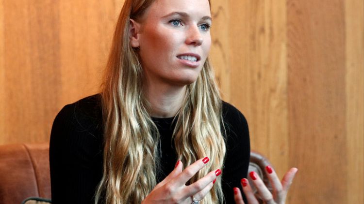 Wozniacki hopes to carry momentum to second WTA Finals win