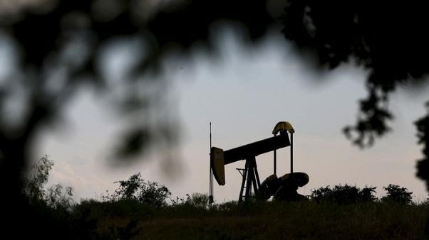 Oil prices edge up, but set for weekly loss on stock build, trade row Oil prices edge up, but set for weekly loss on stock build, trade row