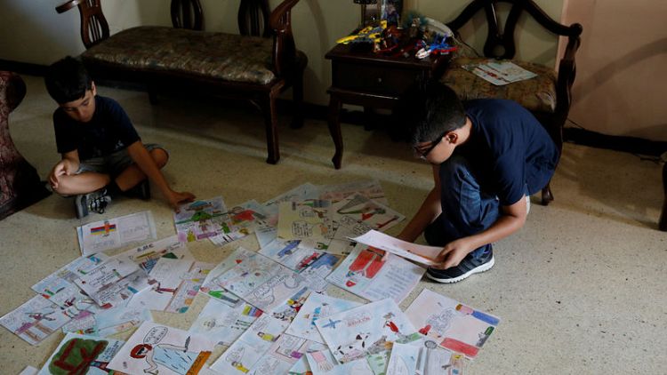 Venezuela teen's political cartoons sketch his country's downfall