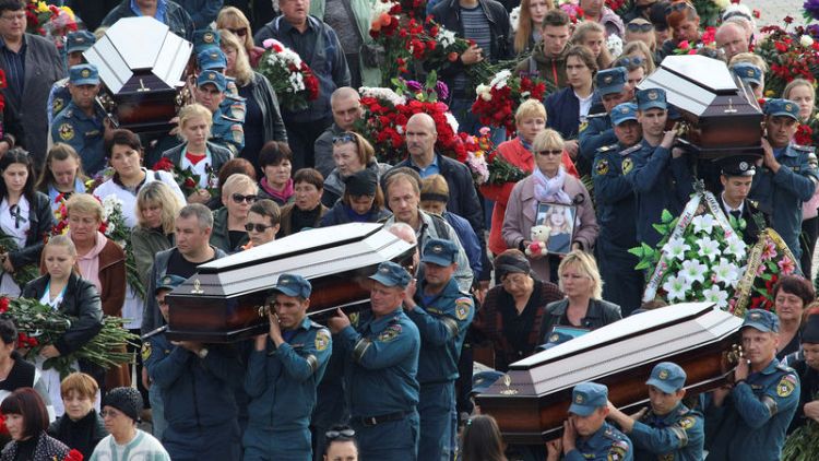 Crimea mourns victims of mass shooting