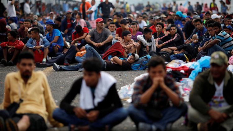 U.S.-bound migrant caravan stuck on Guatemalan border with Mexico