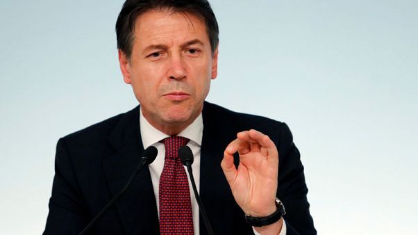 Italy's coalition solves tax row, seeks 'dialogue' with Europe Italy's coalition solves tax row, seeks 'dialogue' with Europe