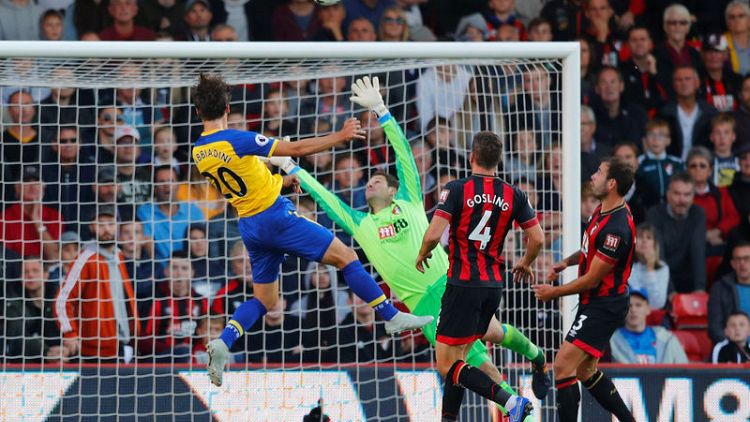 Southampton hold on to claim vital point at Bournemouth