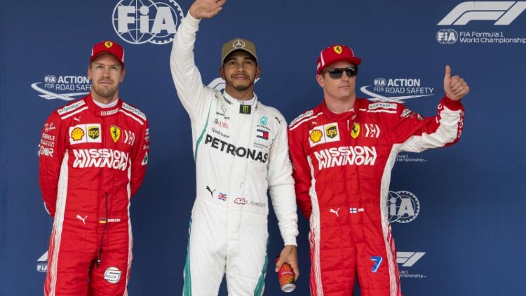 Motor racing - Hamilton on pole in Austin, Vettel starts fifth