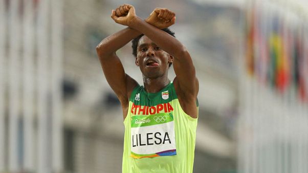 Exiled Ethiopian Olympic runner who protested against government returns home Exiled Ethiopian Olympic runner who protested against government returns home