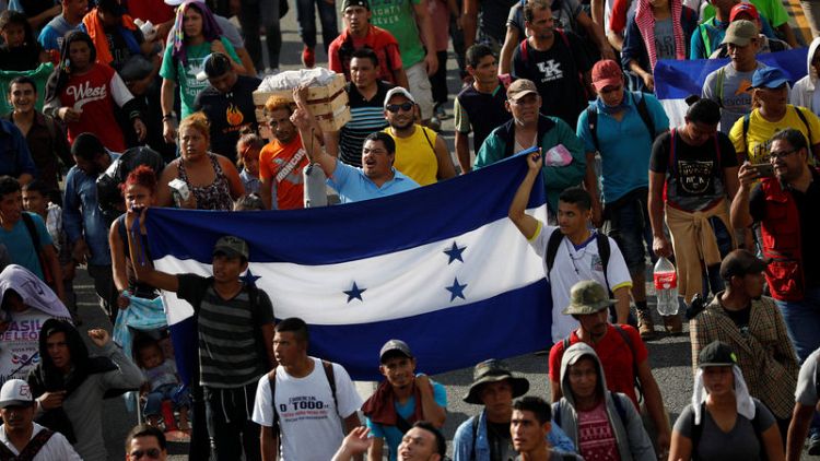 Thousands in U.S.-bound migrant caravan pour into Mexican city