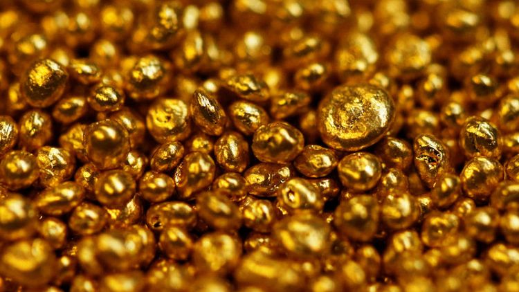 الذهب يهبط مع تراجع الإقبال بفعل ارتفاع الدولار