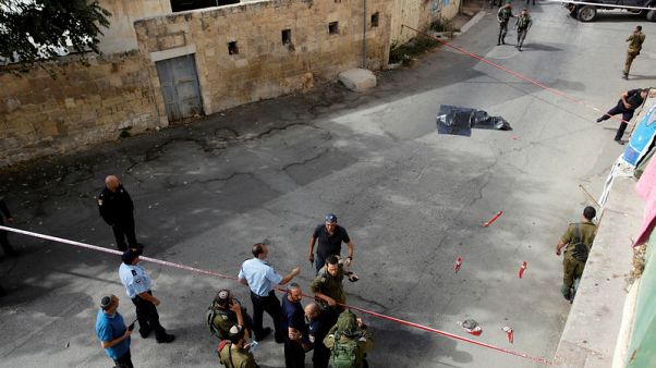 Palestinian stabs Israeli soldier and is shot dead - military Palestinian stabs Israeli soldier and is shot dead - military