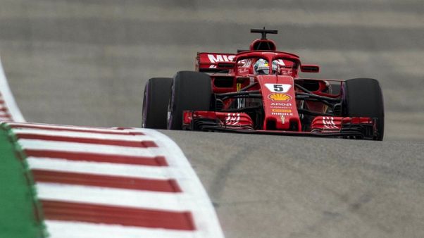 Vettel clings on mathematically for another week Vettel clings on mathematically for another week