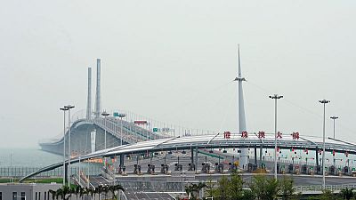 China's Xi opens major sea bridge during symbolic tour to southern China China's Xi opens major sea bridge during symbolic tour to southern China