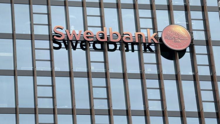 Swedbank third-quarter net profit rise beats forecast