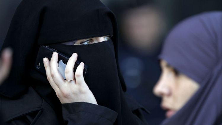 France's ban on full-body Islamic veil violates human rights - U.N. rights panel