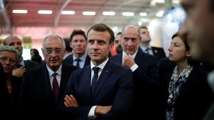 French media urge Macron to keep press room inside Elysee palace
