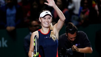 Tennis - Father knows best for Wozniacki as dad calls the shots