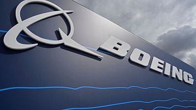 Boeing tops profit estimates, takes further tanker charge Boeing tops profit estimates, takes further tanker charge