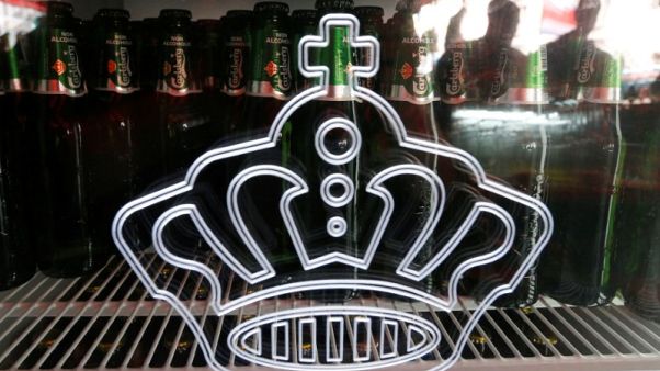Carlsberg lifts 2018 profit guidance after warm summer in Europe Carlsberg lifts 2018 profit guidance after warm summer in Europe