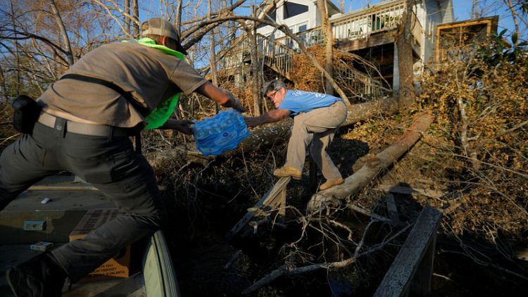 Volunteers rush to aid survivors after Hurricane Michael