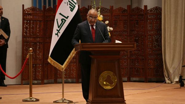 رئيس الوزراء العراقي الجديد يؤدي اليمين بعد إقرار جزء من تشكيلته الحكومية رئيس الوزراء العراقي الجديد يؤدي اليمين بعد إقرار جزء من تشكيلته الحكومية