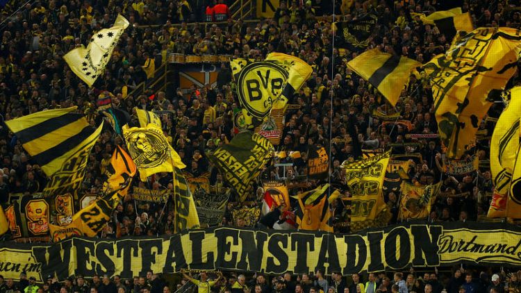 Sparkling Dortmund crush Atletico 4-0 to top Group A