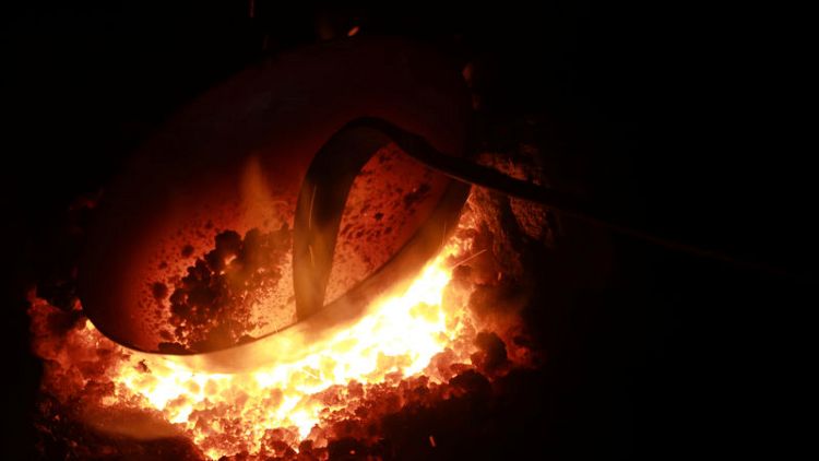 Hammer and tongs - China entrepreneur leads handmade wok revival