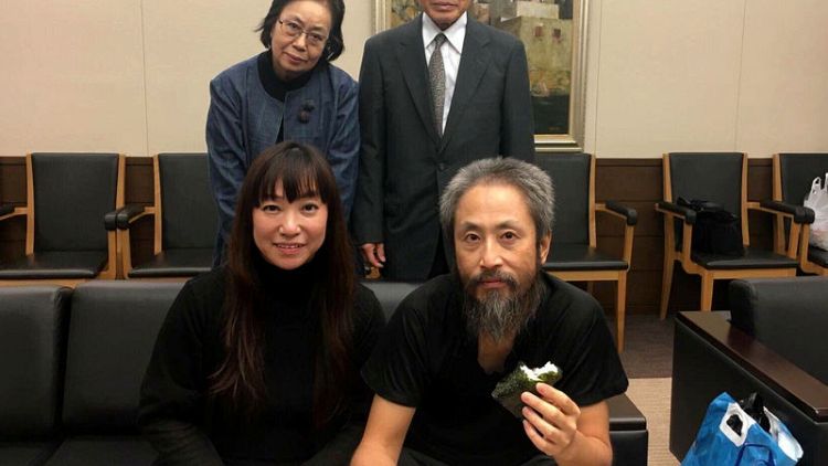Rice balls for Japan hostage as he returns home from Syrian 'hell'
