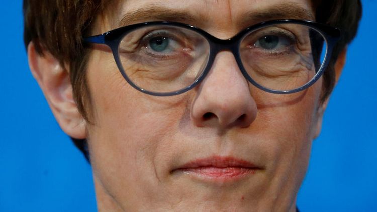 Merkel protege issues stark warning to SPD before state election