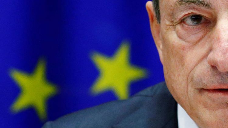 ECB's Draghi defends his independence amid attacks from Italy