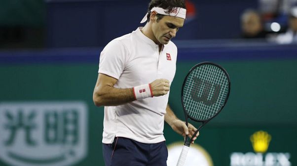 Federer reaches semi-finals after being stretched by Simon Federer reaches semi-finals after being stretched by Simon