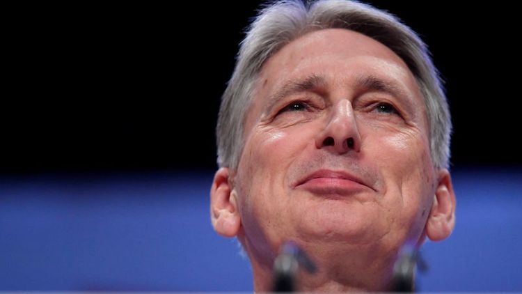 Hammond to bring forward tax cuts by a year - Telegraph
