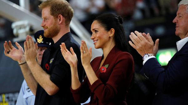 Prince Harry and Meghan attend final day of Invictus Games in Sydney Prince Harry and Meghan attend final day of Invictus Games in Sydney