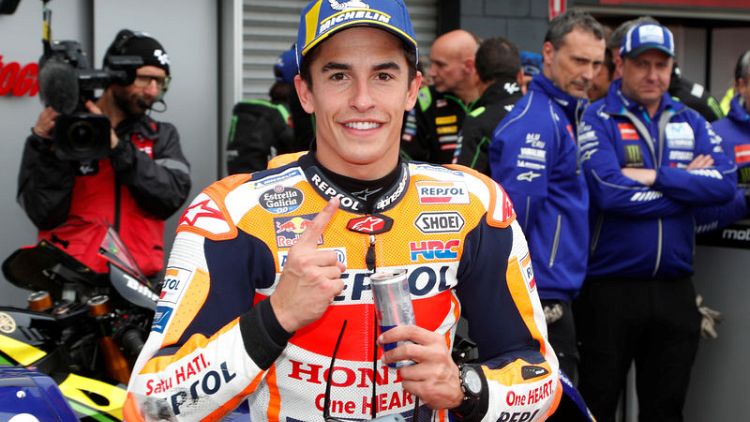 Motorcycling - Champion Marquez puts Honda on pole in Australia