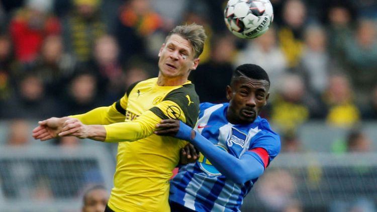 Late Kalou penalty earns Hertha a point at Dortmund