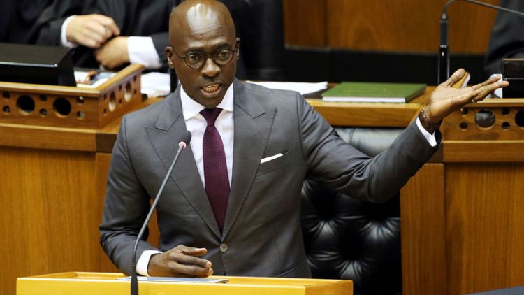 South African home affairs minister says he was blackmailed over sex video