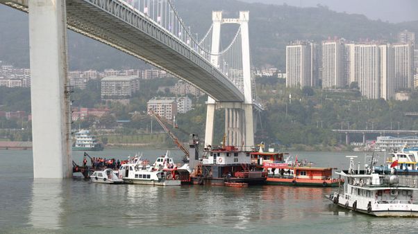 Two dead after China bus plunges 60 metres into river - state media Two dead after China bus plunges 60 metres into river - state media