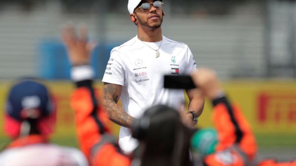 Hamilton matches Fangio, a champion for the ages Hamilton matches Fangio, a champion for the ages